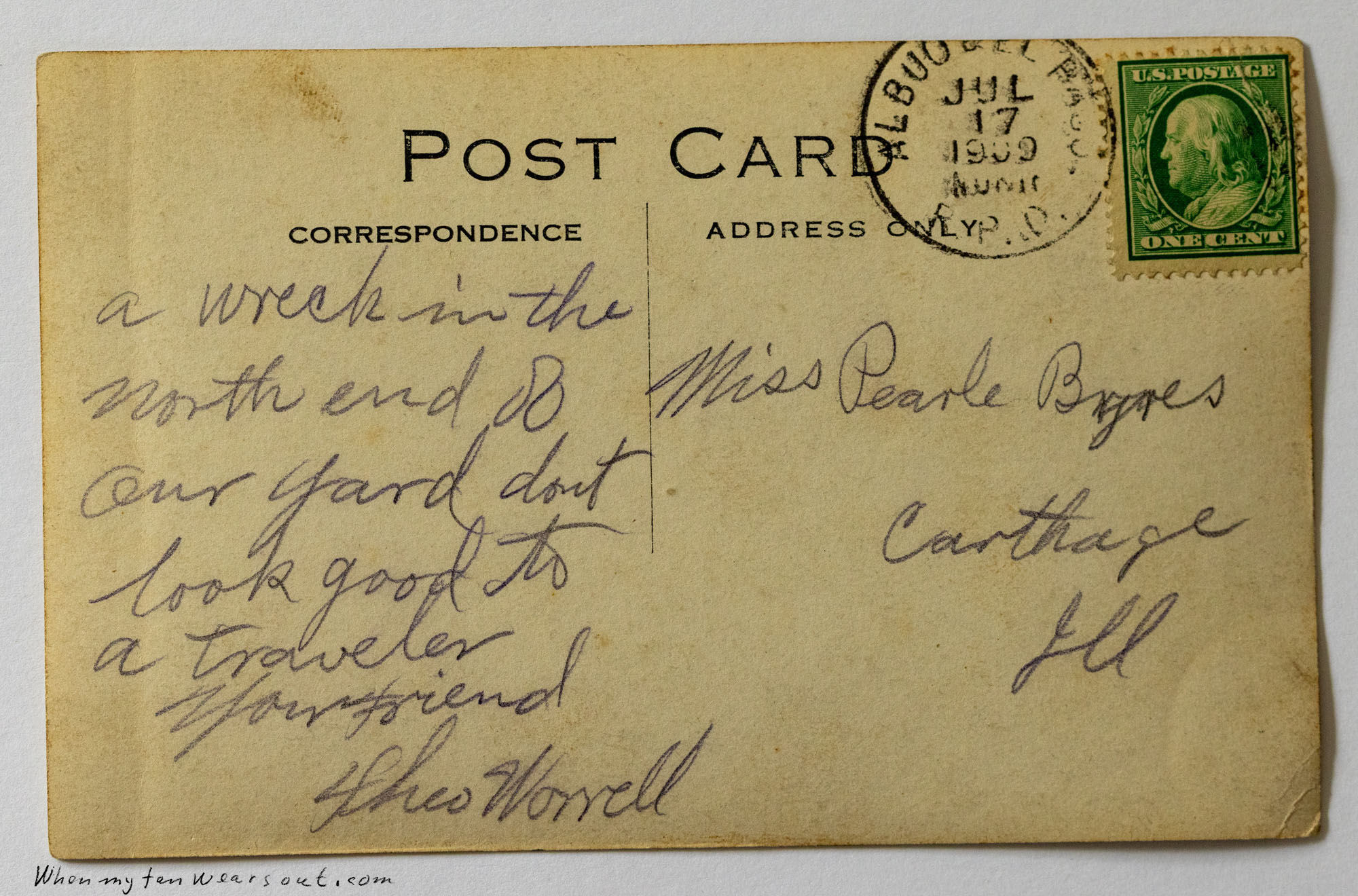 The back of a vintage postcard with a one-cent George Washington U.S. postage stamp postmarked