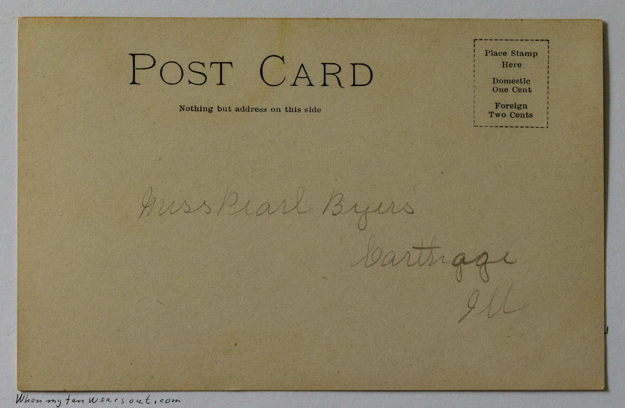 The undivided back of a vintage postcard features the printed text