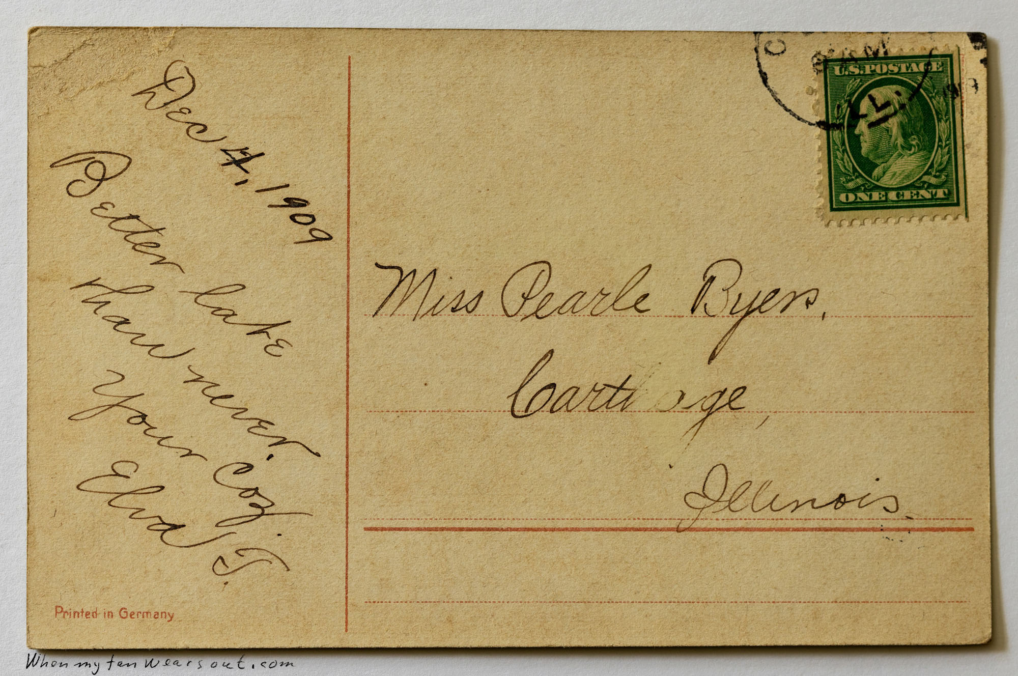 Back of a vintage postcard with a green one-cent George Washington stamp and a round postmark, handwritten cursive address to Miss Pearle Byer in Carthage, Illinois, and a handwritten message dated Dec 4, 1909, from Elva J. S. on a light brown divided back.